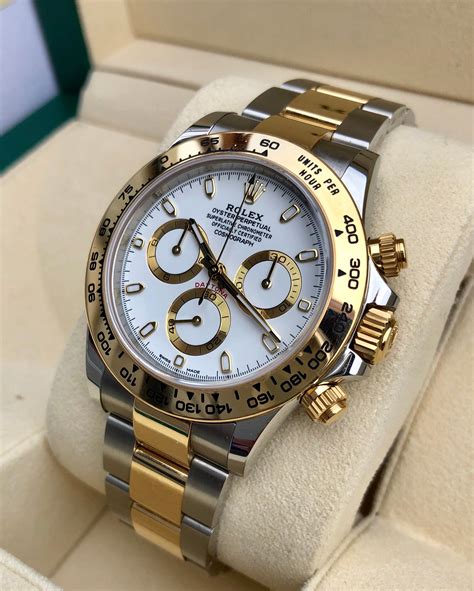 rolex daytona silver and gold